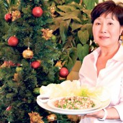Owner June Kim with Vegetables Served with Iceberg Lettuce Wrap ($9.95)