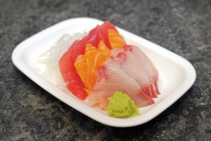 Ahi, salmon and hamachi sashimi from the dinner menu. Lawrence Tabudlo photo