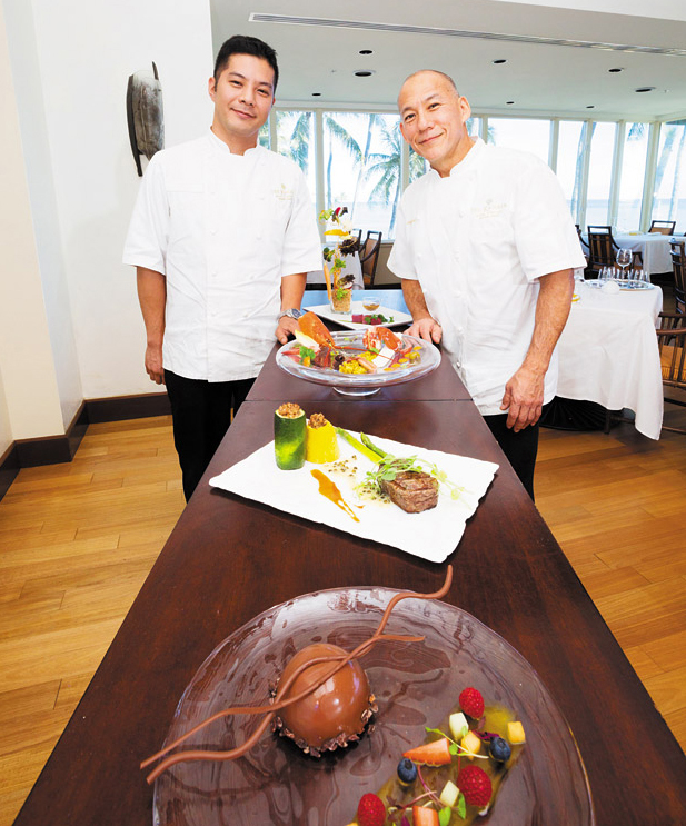 Chef de cuisine Hiroshi Inoue and executive chef Wayne Hirabayashi with a slew of Hoku's new menu items