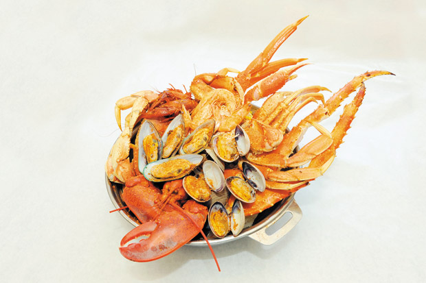 An array of Crab Bucket's delectable seafood options 