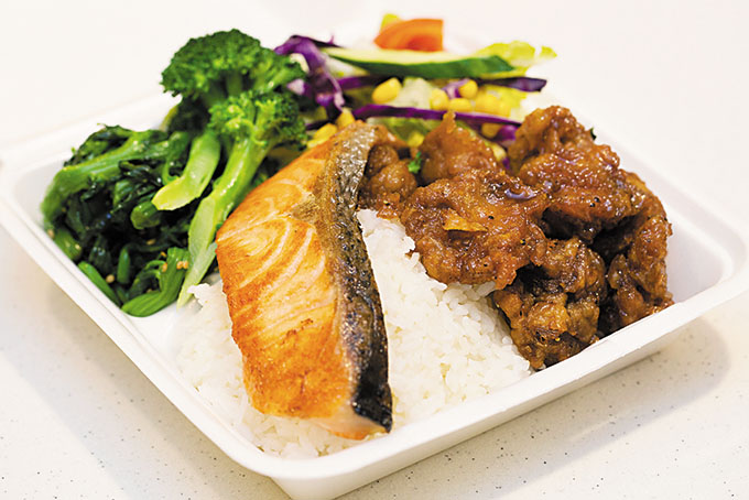 Two-choice Plate Lunch ($11.99; shown with garlic chicken and salmon)