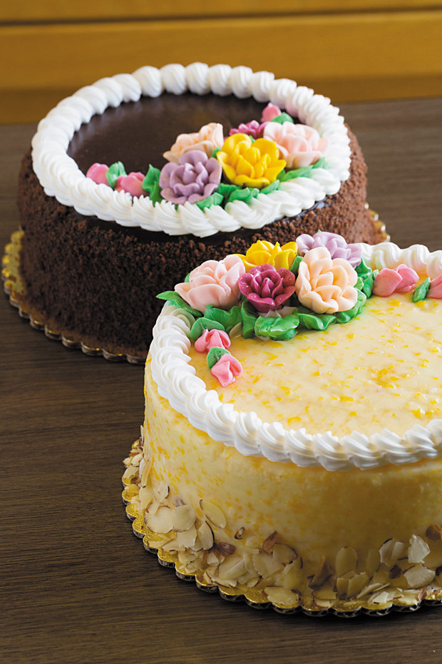 Decorated Mother's Day Dobash Cake ($17.25) and Decorated Peach Bavarian Cake ($18.75). Prices may vary at locations. 