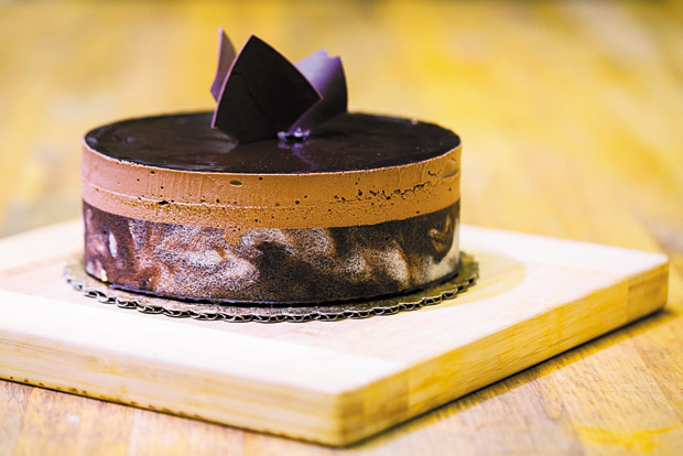 Valrhona Dark Chocolate Mousse Cake (pictured is the 7-inch cake for $36)