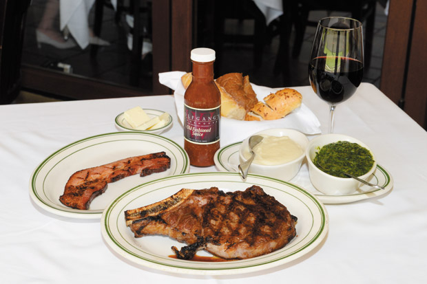 "Go Big or Go Home" Father's Day special: Extra thick slice of Sizzling Canadian Bacon, 24-26 ounces of Prime Bone-in Ribeye Steak, Mashed Potatoes, Creamed Spinach and a big glass of cabernet ($74.95)