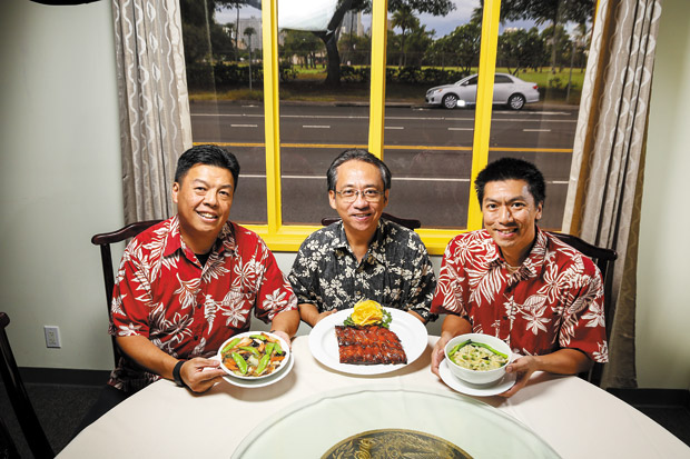 (Left to right) Co-owners Joe Wong, Michael Wang and Ryan Wang