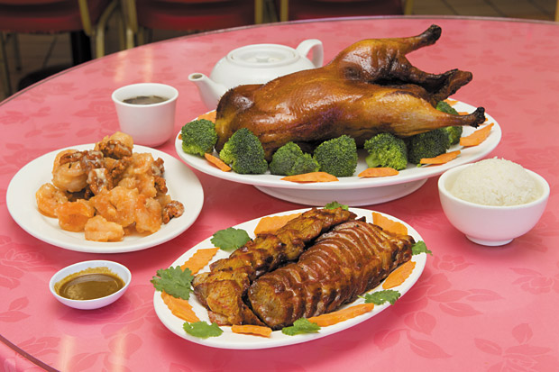 (Clockwise, from top) Hong Kong-style Roast Duck ($25 for the whole duck), Honey Walnut Shrimp with Mayonnaise ($12.95 per pound) and Char Siu ($10.95 per pound)