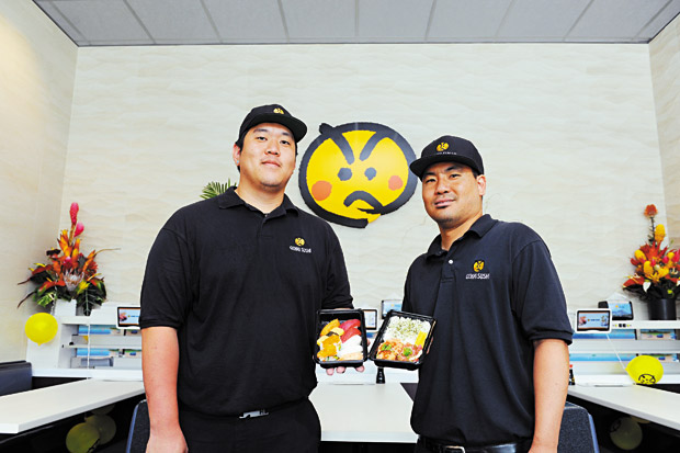Assistant manager Sean Moon and lead supervisor Shane Masumura make diners feel at home in the recently opened eatery. 