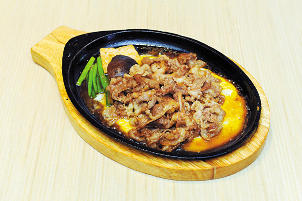 Osaka's Sukiyaki ($10) with shoyu-, sugarand sake-accented beef, vegetables and bean curd 
