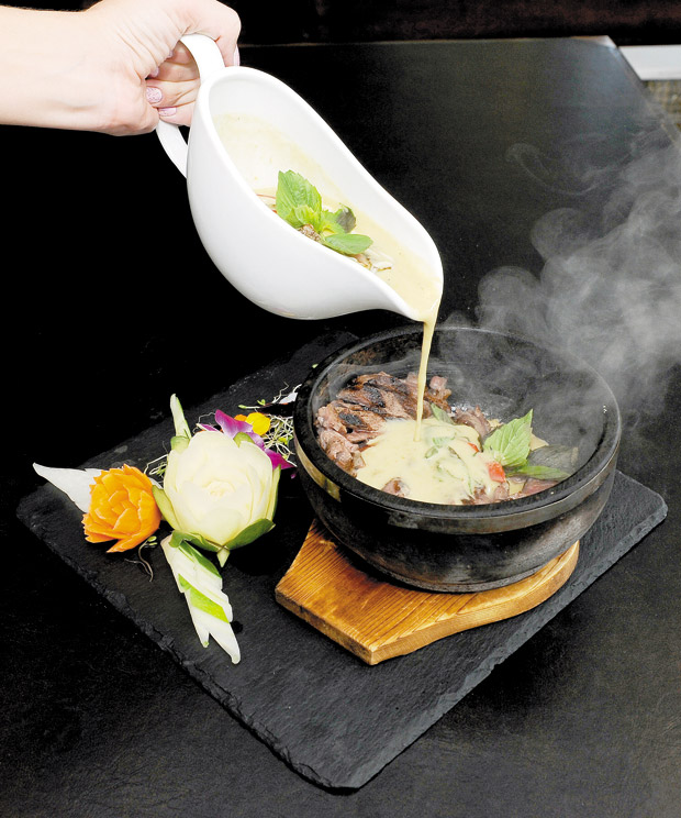 Noi Thai's Green Curry Beef (Wagyu), priced at $54.