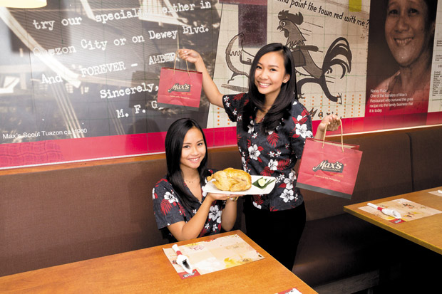 Monica and Michelle San Luis of Max's of Manila showcase the famed Max's Fried Chicken.