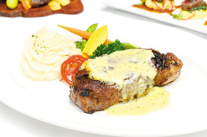 14-ounce Bison Ribeye with Herb-Bleu Cheese Compound Butter ($60)