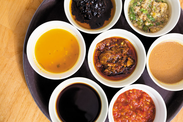 Assorted sauces add flavor to your hot-pot experience.