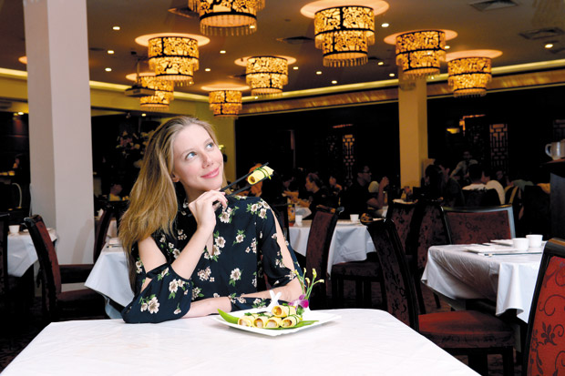 The editor ponders while dining on Jade Dynasty's Roasted Pork with Chinese Crepes.  