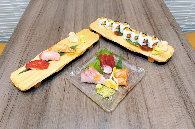 Three Nigiri Sushi ($8), Assorted Sashimi ($18), Spicy Tuna Roll ($9)