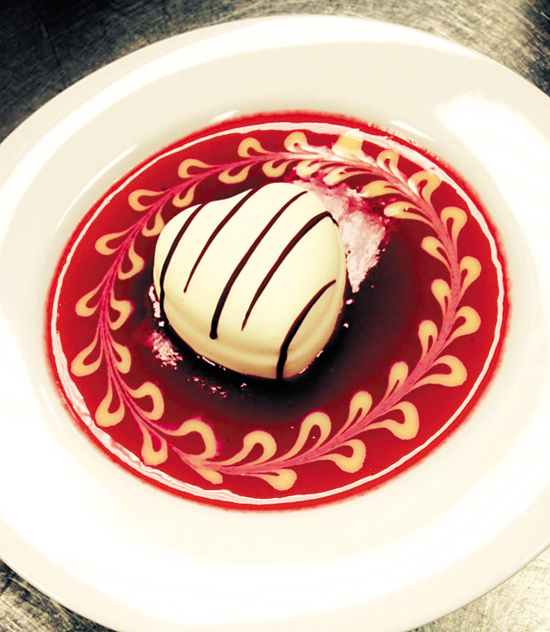 White Chocolate Amore Truffle with Raspberry Guava Puree (dessert choice from Monthly Full Moon Concert dinner event). File photo