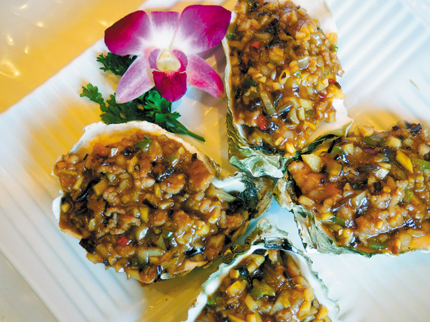 No. 111 Steamed Oysters in Half Shell with Meat Sauce ($14.95)