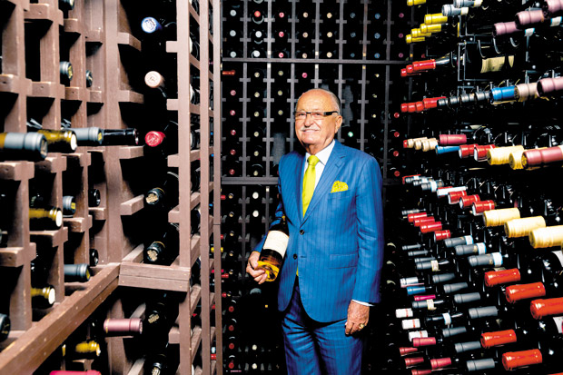 Owner Wolfgang Zwiener is surrounded by a vast selection of fine wines within Il Lupino's wine cellar.