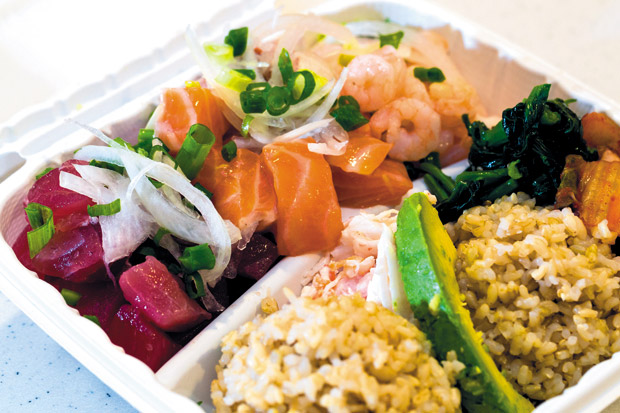 Large PokeBox shown with ahi, salmon and shrimp, as well as rice and two toppings ($14.99) 
