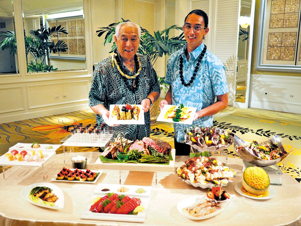 Legendary island musician Danny Kaleikini (at left) and grandson Nicholas present buffet highlights from the upcoming Mother's Day Brunch at The Kahala's Maile Room, where they'll perform on the upcoming holiday.