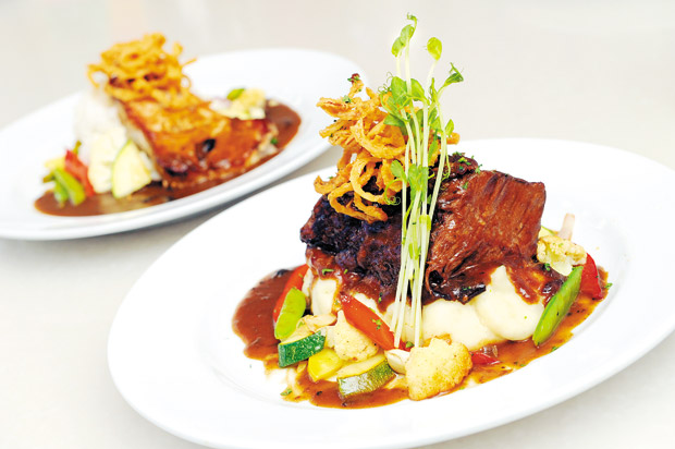 Pacific Rim Style Braised Beef ($24) is a signature entree at MAC 24/7. 