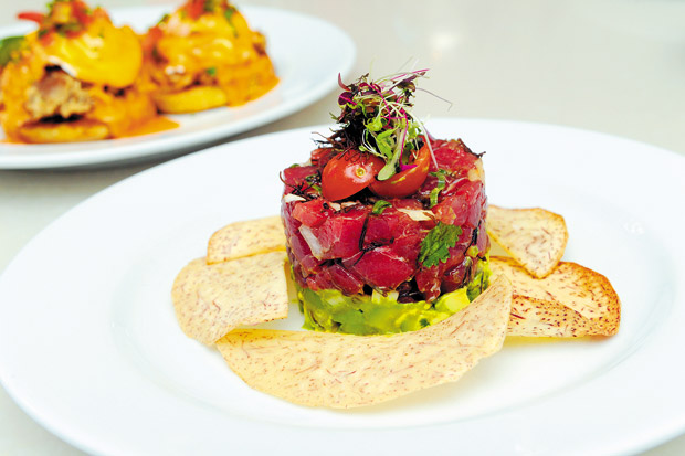 Ahi Poke Stack ($16) is one of the most popular pupus on the menu. 